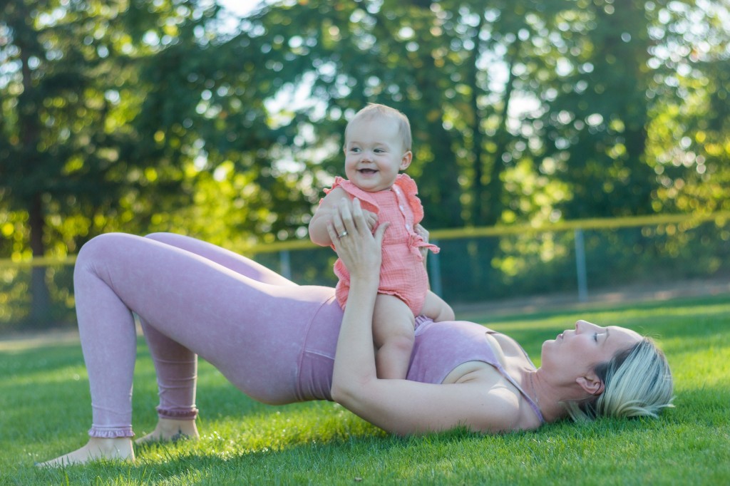 Women exercising with baby