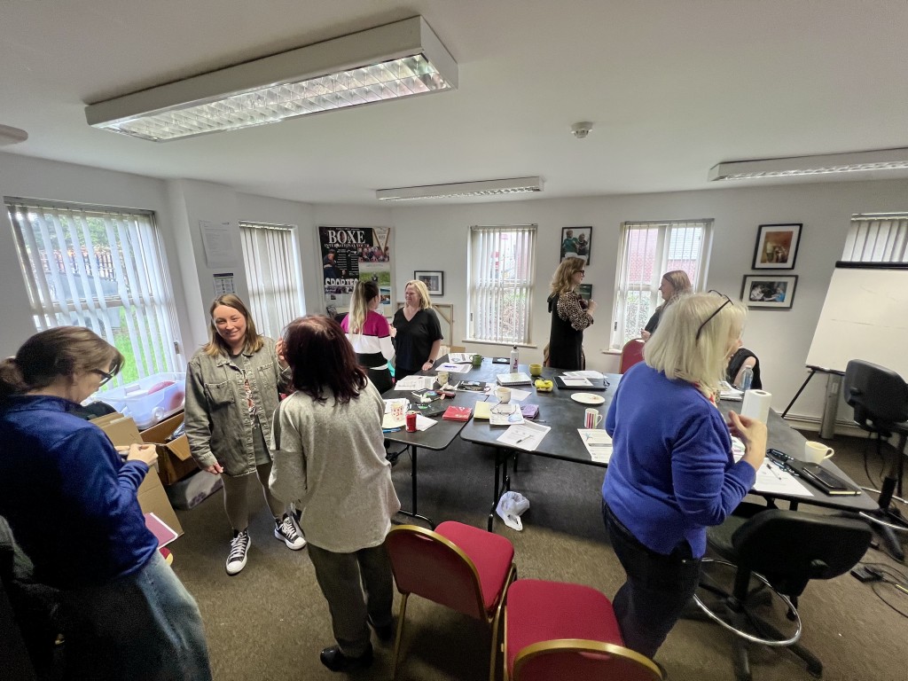 A classroom full of coaches attending a workshop on Physical Literacy